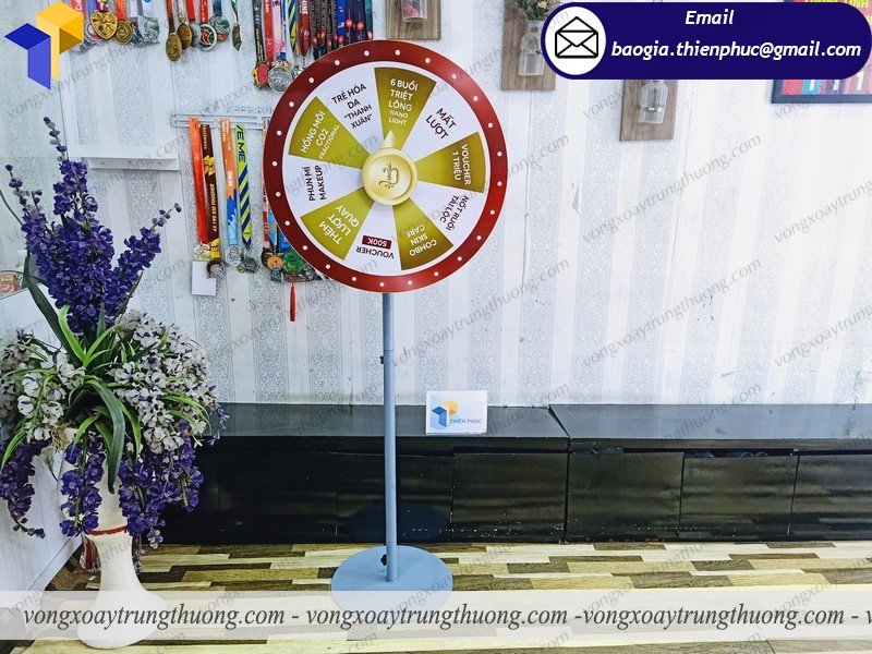 báo giá vòng quay trúng thưởng chân đứng