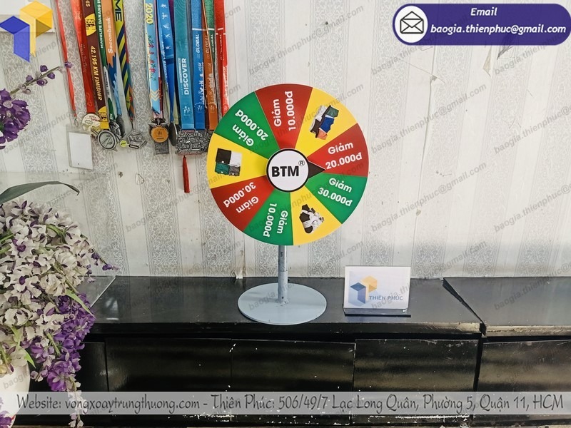 vòng quay quảng cáo để bàn